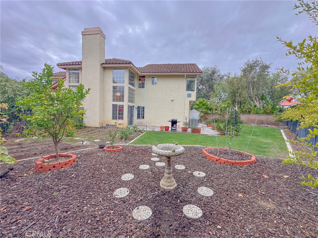 31785 Vía Del Viento Trabuco Canyon, CA 92679 - Photo 33 of 50 a view of a house with a yard