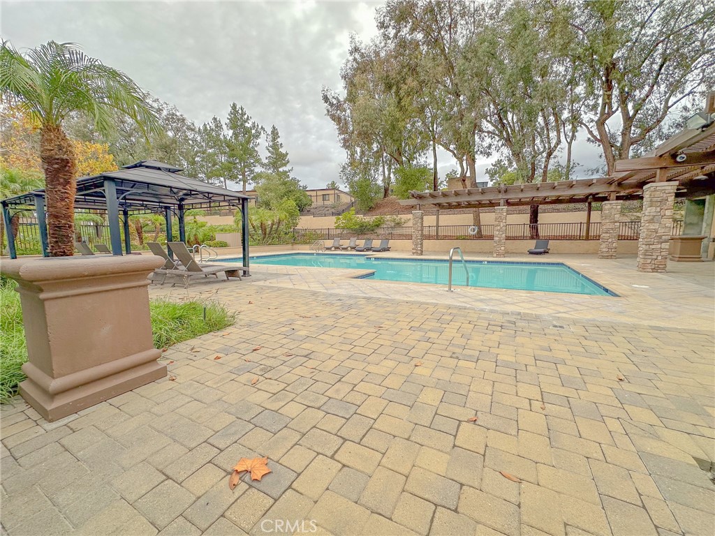 31785 Vía Del Viento Trabuco Canyon, CA 92679 - Photo 47 of 50 a view of backyard with swimming pool and seating space