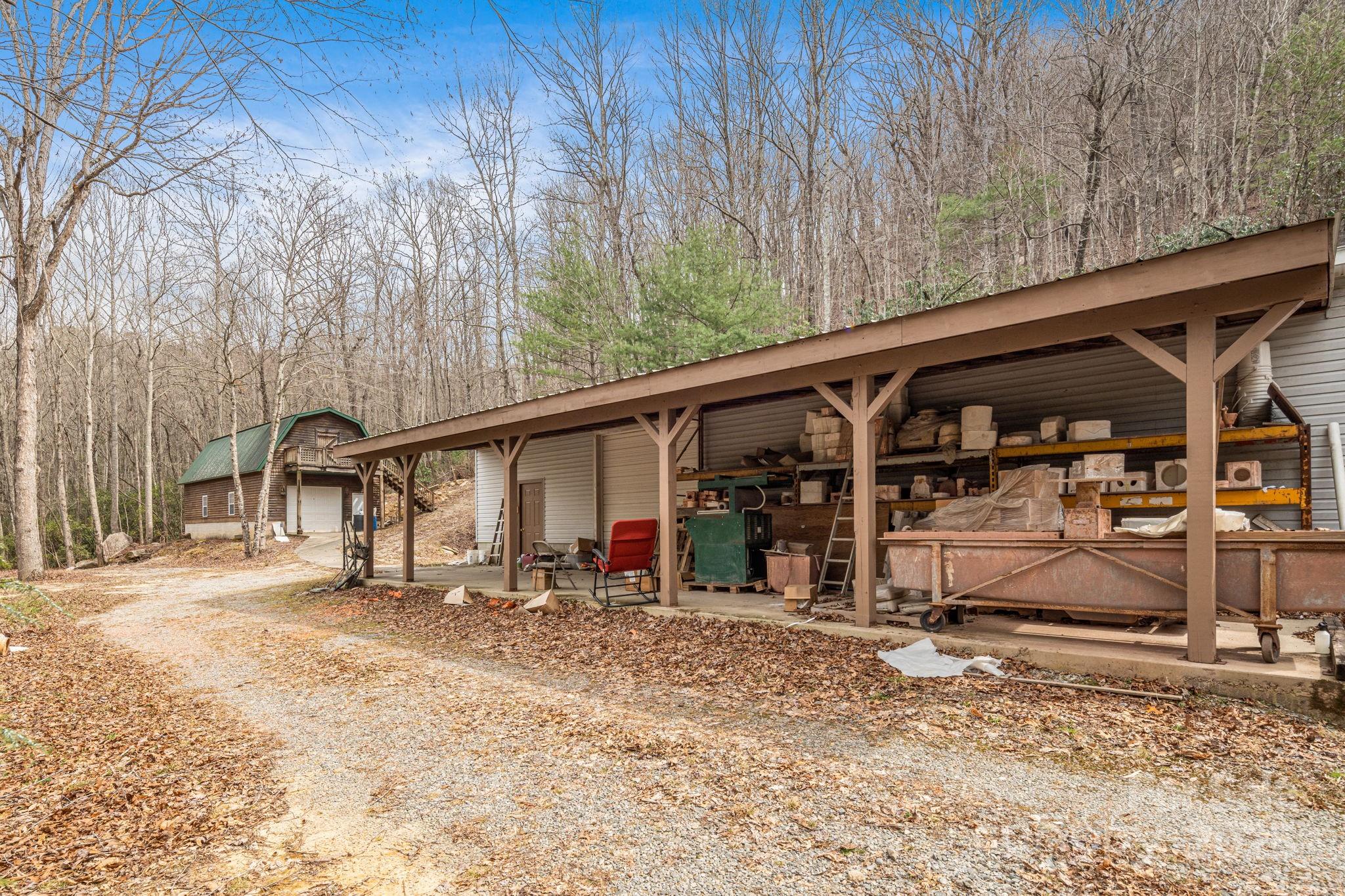 5389 Cascade Lake Road Cedar Mountain, NC 28718 - Photo 12 of 39 a view of a car park in front of house