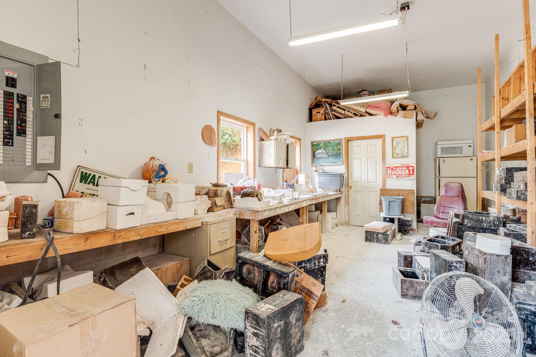 5389 Cascade Lake Road Cedar Mountain, NC 28718 - Photo 13 of 39 a room with gym equipment and a view of living room