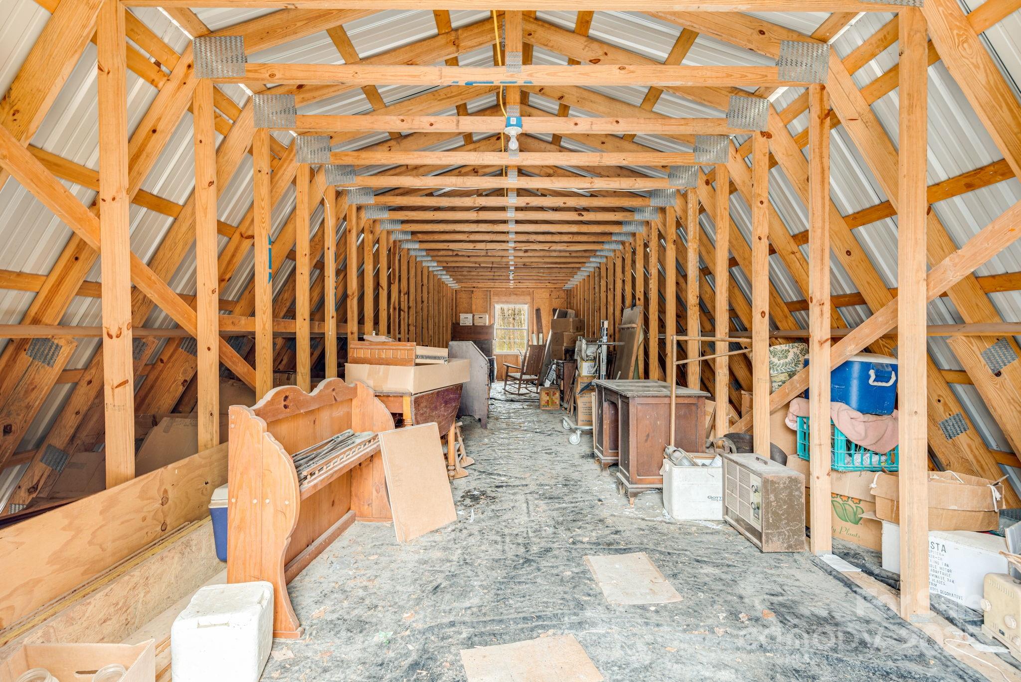 5389 Cascade Lake Road Cedar Mountain, NC 28718 - Photo 17 of 39 a view of an outdoor space with porch area with seating area