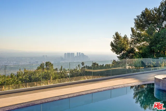 a view of a balcony with city view