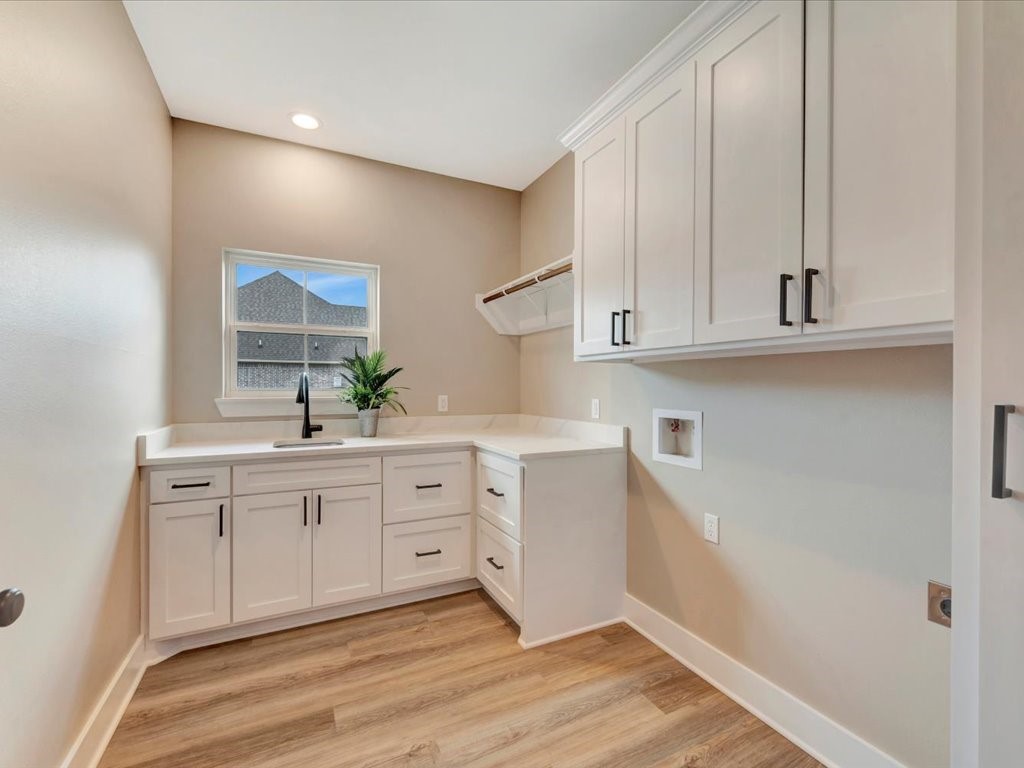 537 C C Road Diboll, TX 75941 - Photo 31 of 37 a spacious bathroom with a sink and a mirror