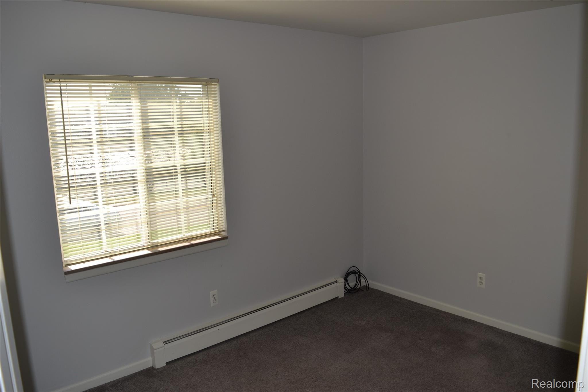 451 Miller Avenue, Unit 111 Rochester, MI 48307 - Photo 17 of 26 17 - Bedroom 2.JPG