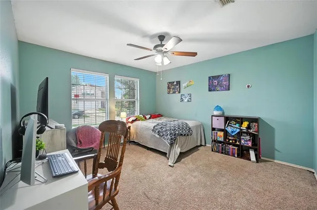 a kitchen with stainless steel appliances a stove sink and microwave