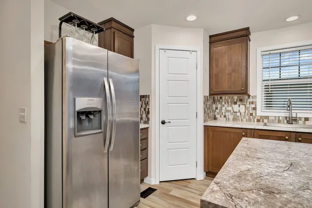 a bathroom with a shower and a sink