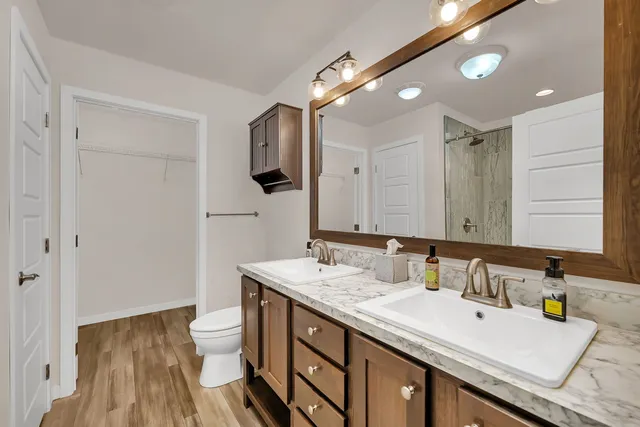 a bathroom with a shower and a tub