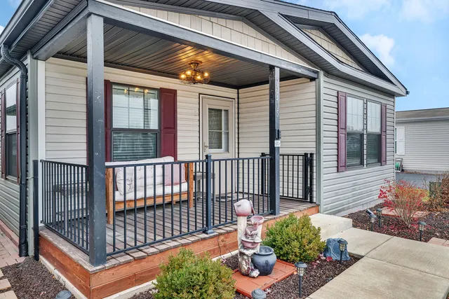 a view of a porch with furniture