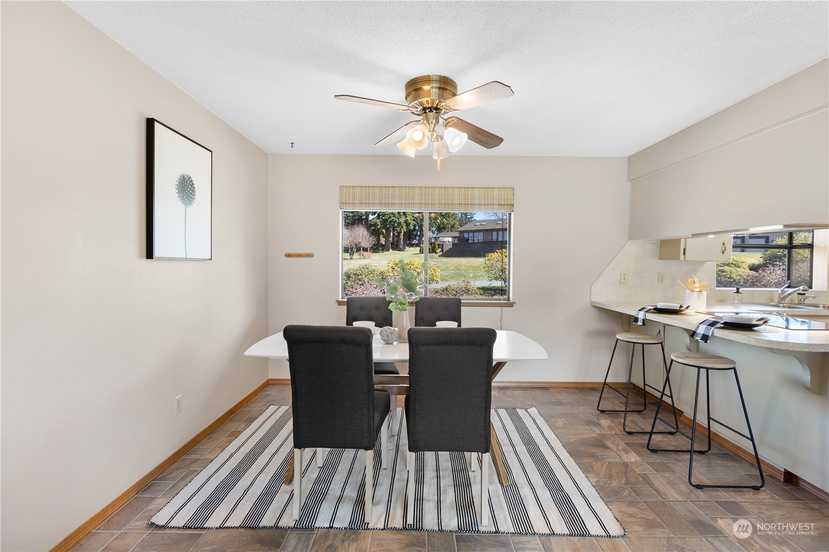 5102 Fobes Road Snohomish, WA 98290 - Photo 11 of 40 a view of a dining room with furniture window and wooden floor