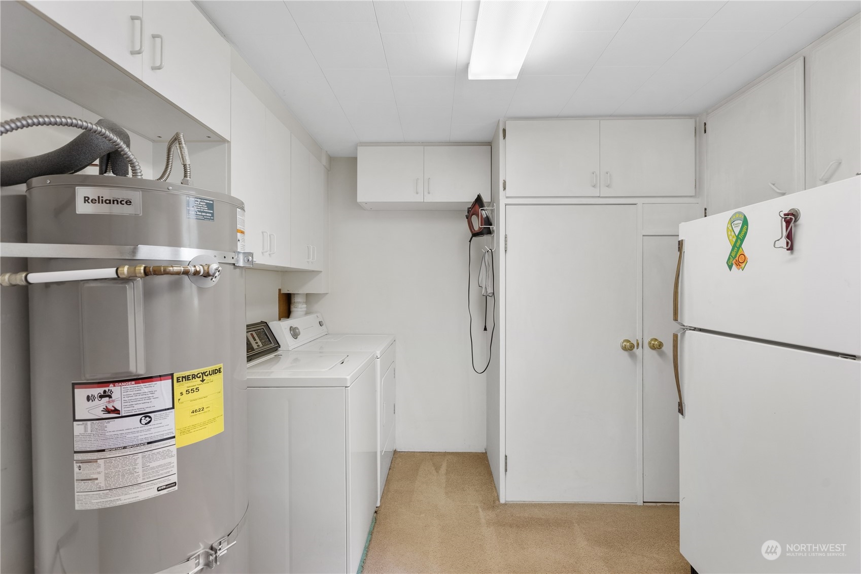 5102 Fobes Road Snohomish, WA 98290 - Photo 22 of 40 a white refrigerator freezer and a stove sitting inside of a kitchen