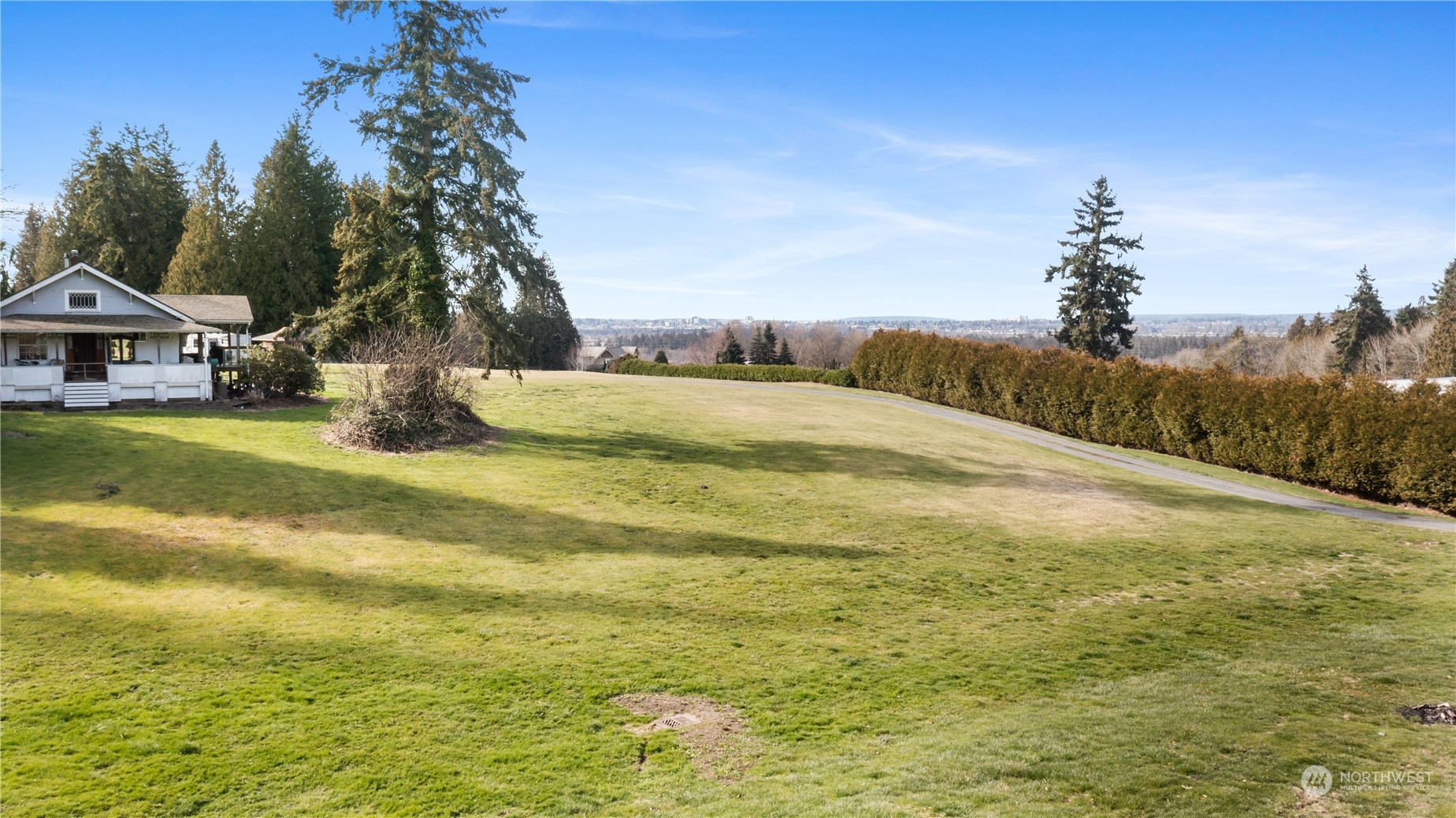 5102 Fobes Road Snohomish, WA 98290 - Photo 4 of 40 a swimming pool with trees in front of it
