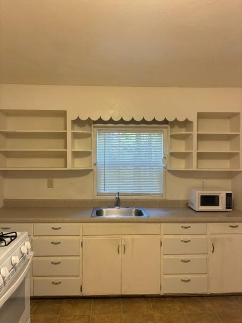 2823 Blair Road Pollock Pines, CA 95726 - Photo 2 of 15 a view of white cabinets and outdoor space