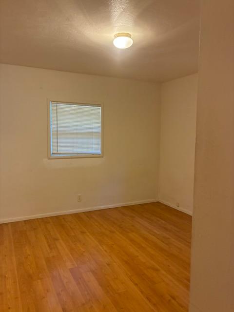 2823 Blair Road Pollock Pines, CA 95726 - Photo 8 of 15 an empty room with a empty space and a window