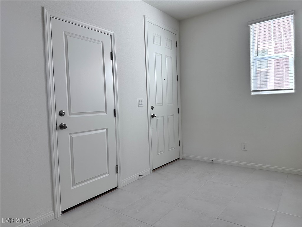 3634 Cameri Avenue Henderson, NV 89044 - Photo 21 of 22 Unfurnished bedroom featuring baseboards