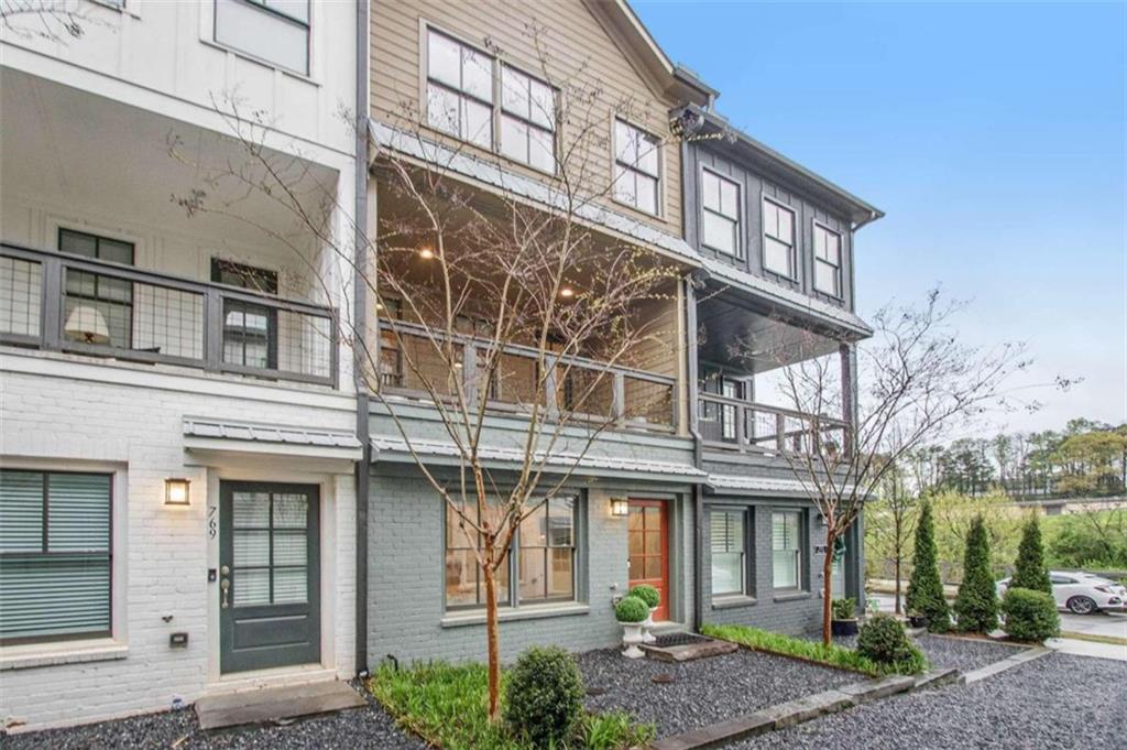 front view of a building with a yard