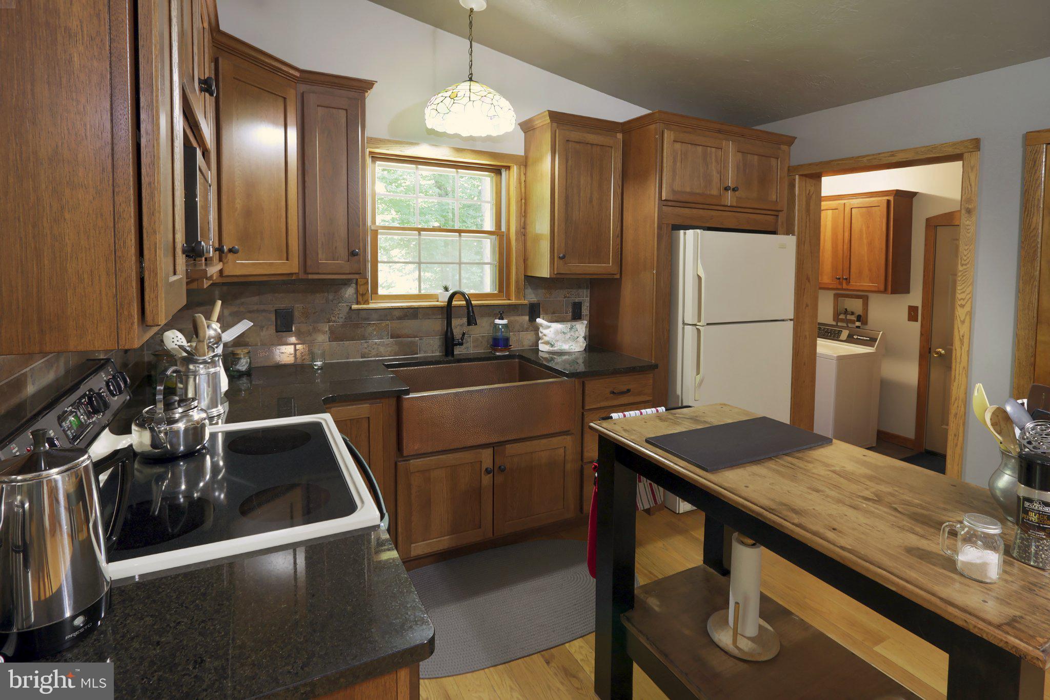 1580 Girl Scout Road Denver, PA 17517 - Photo 9 of 47 Warm, inviting kitchen space with hardwood floors