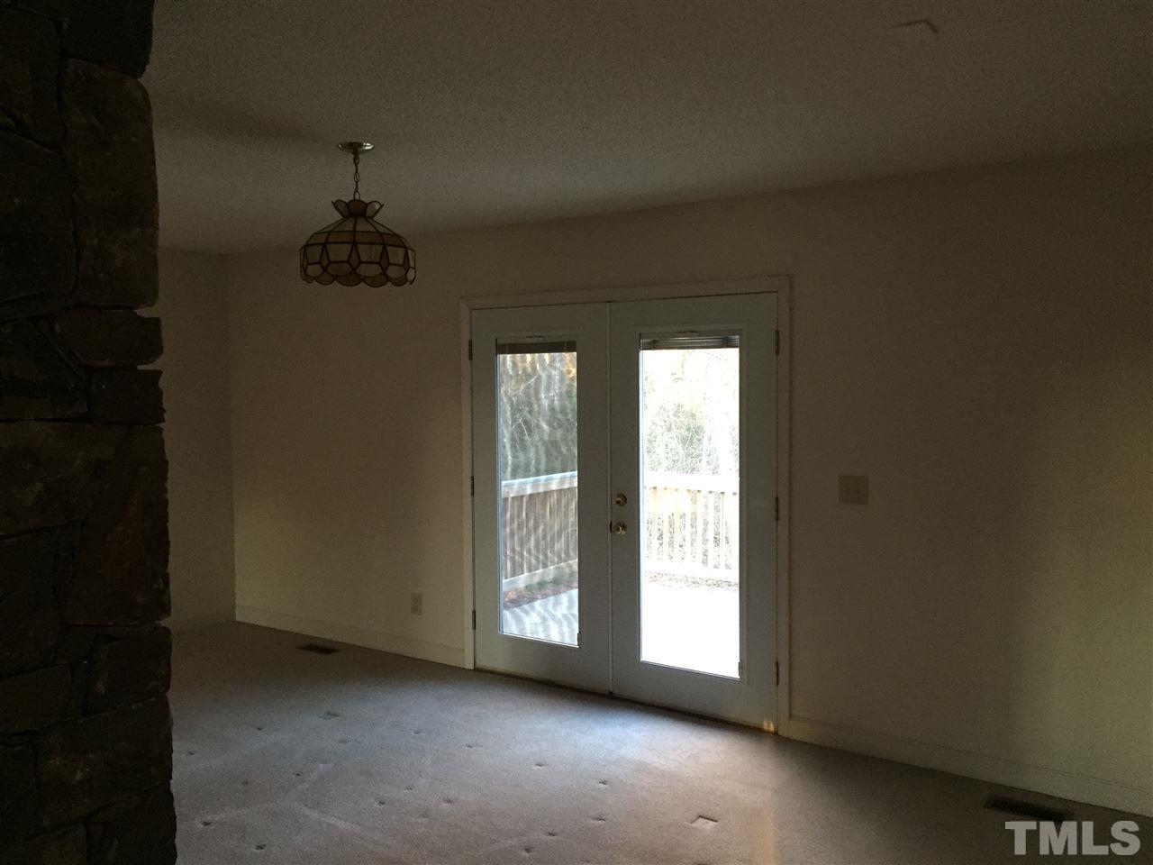 4333 Lynne Carol Way Raleigh, NC 27616 - Photo 5 of 17 Dining area. Doors to deck have built in blinds.