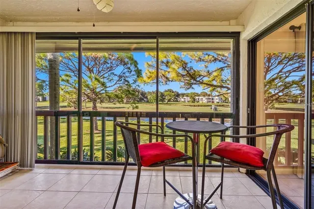 a view of a balcony and an outdoor seating