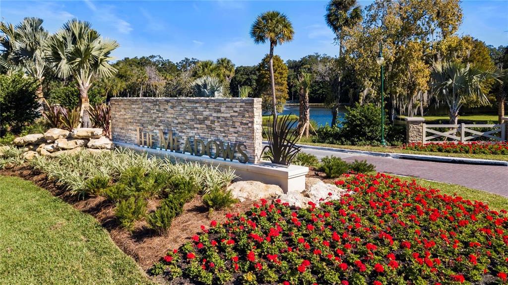 5147 Willow Links, Unit 18 Sarasota, FL 34235 - Photo 4 of 30 a view of a garden with flowers
