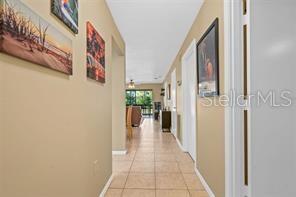 5147 Willow Links, Unit 18 Sarasota, FL 34235 - Photo 7 of 30 a view of a hallway with a dining area