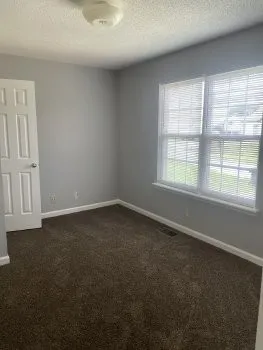 an empty room with a window