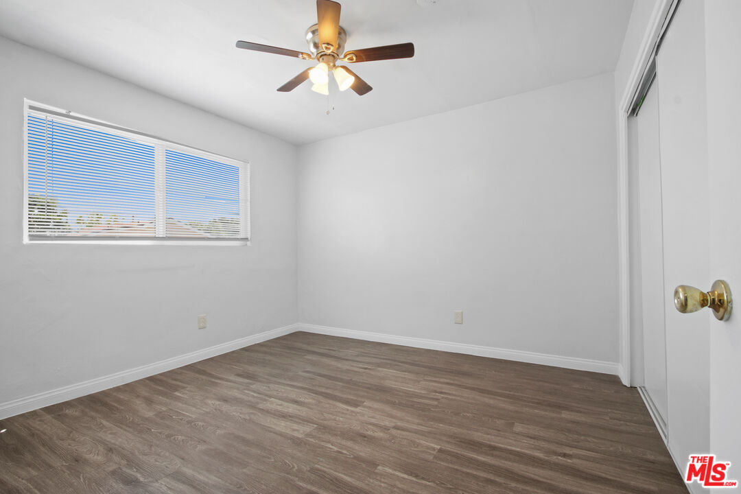 115 North Oak Street, Unit 15 Inglewood, CA 90301 - Photo 14 of 16 a view of empty room with wooden floor and fan