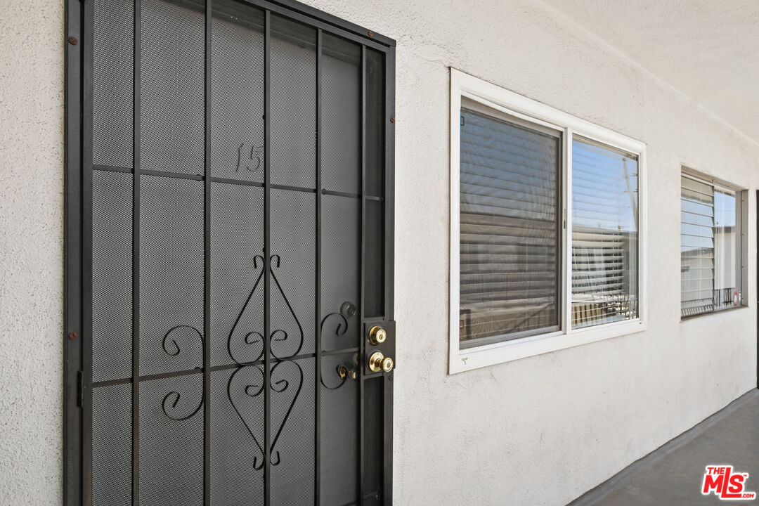 115 North Oak Street, Unit 15 Inglewood, CA 90301 - Photo 8 of 16 a view of a wooden door with a window