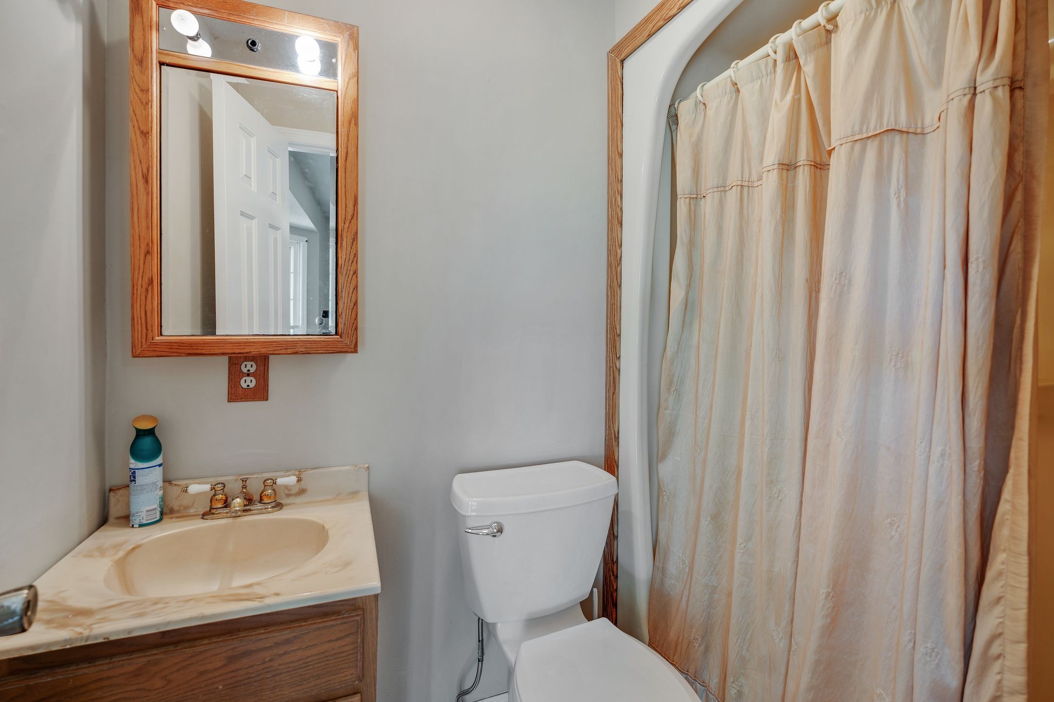 155 Marcella Falls Road Ethridge, TN 38456 - Photo 15 of 33 a bathroom with a sink a toilet and shower curtain