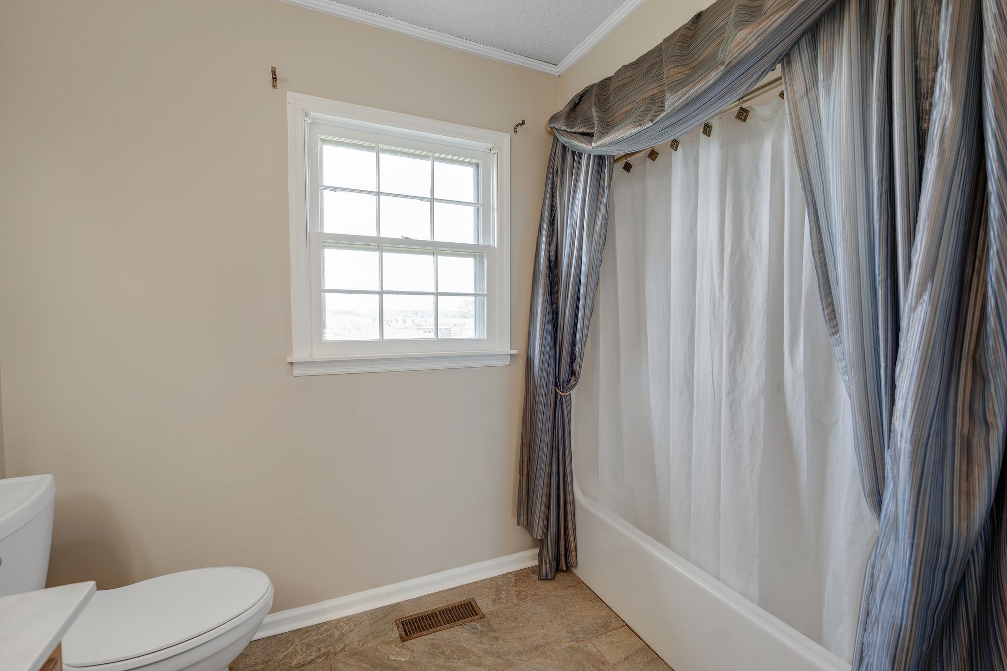 155 Marcella Falls Road Ethridge, TN 38456 - Photo 21 of 33 a bathroom with a toilet and a shower
