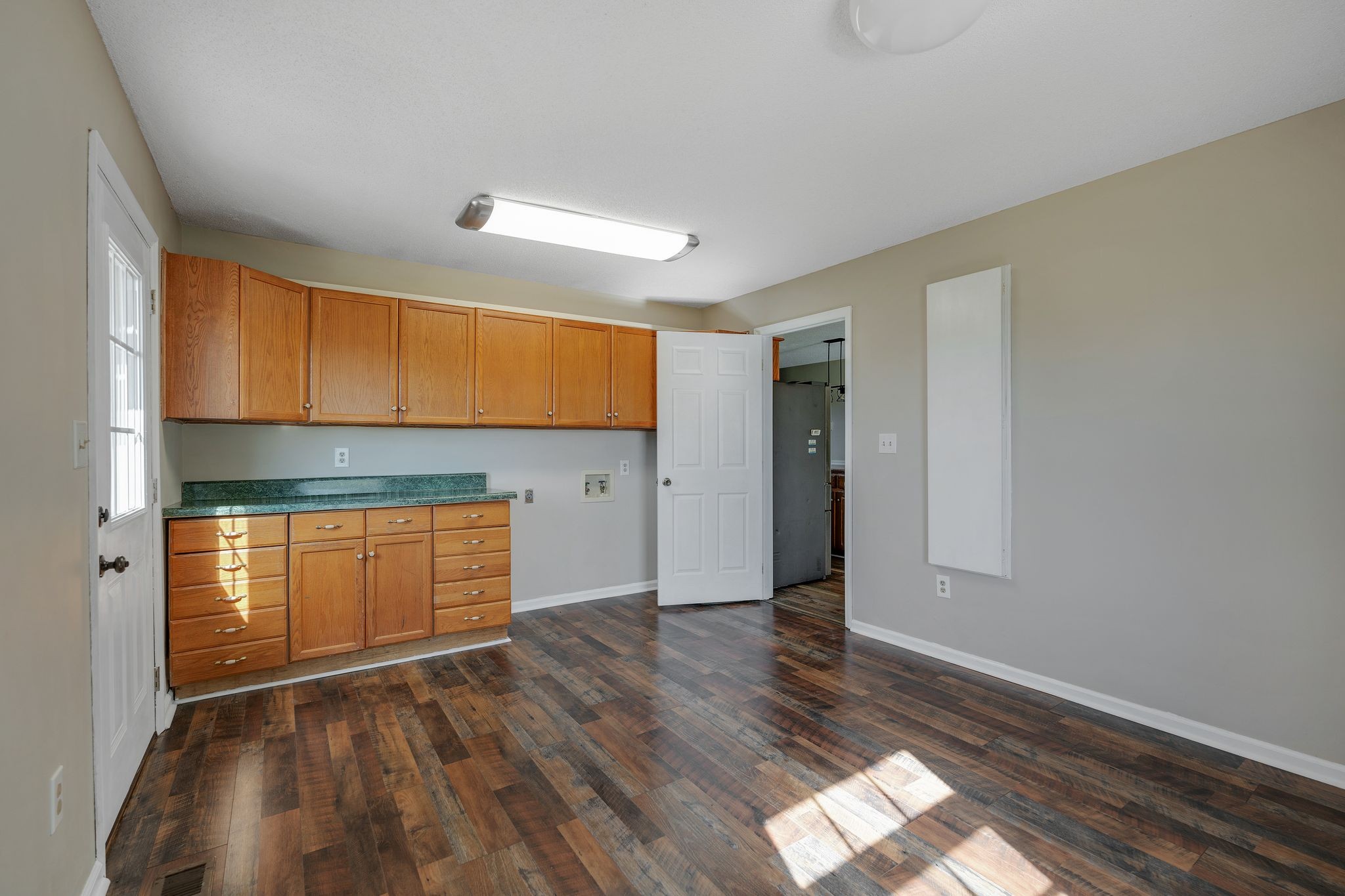 155 Marcella Falls Road Ethridge, TN 38456 - Photo 22 of 33 a view of kitchen with wooden floor and electronic appliances