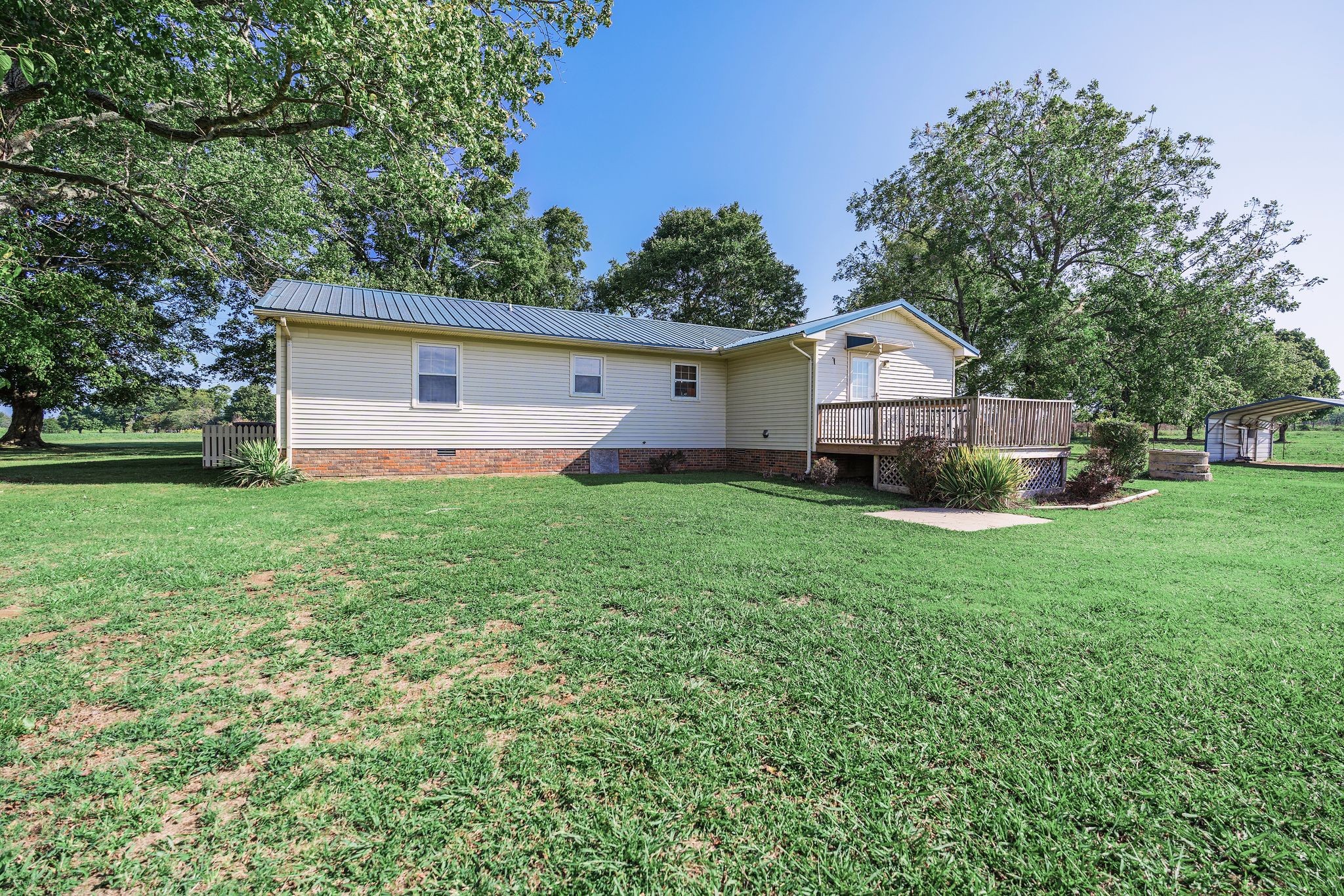 155 Marcella Falls Road Ethridge, TN 38456 - Photo 26 of 33 a view of a house with a yard