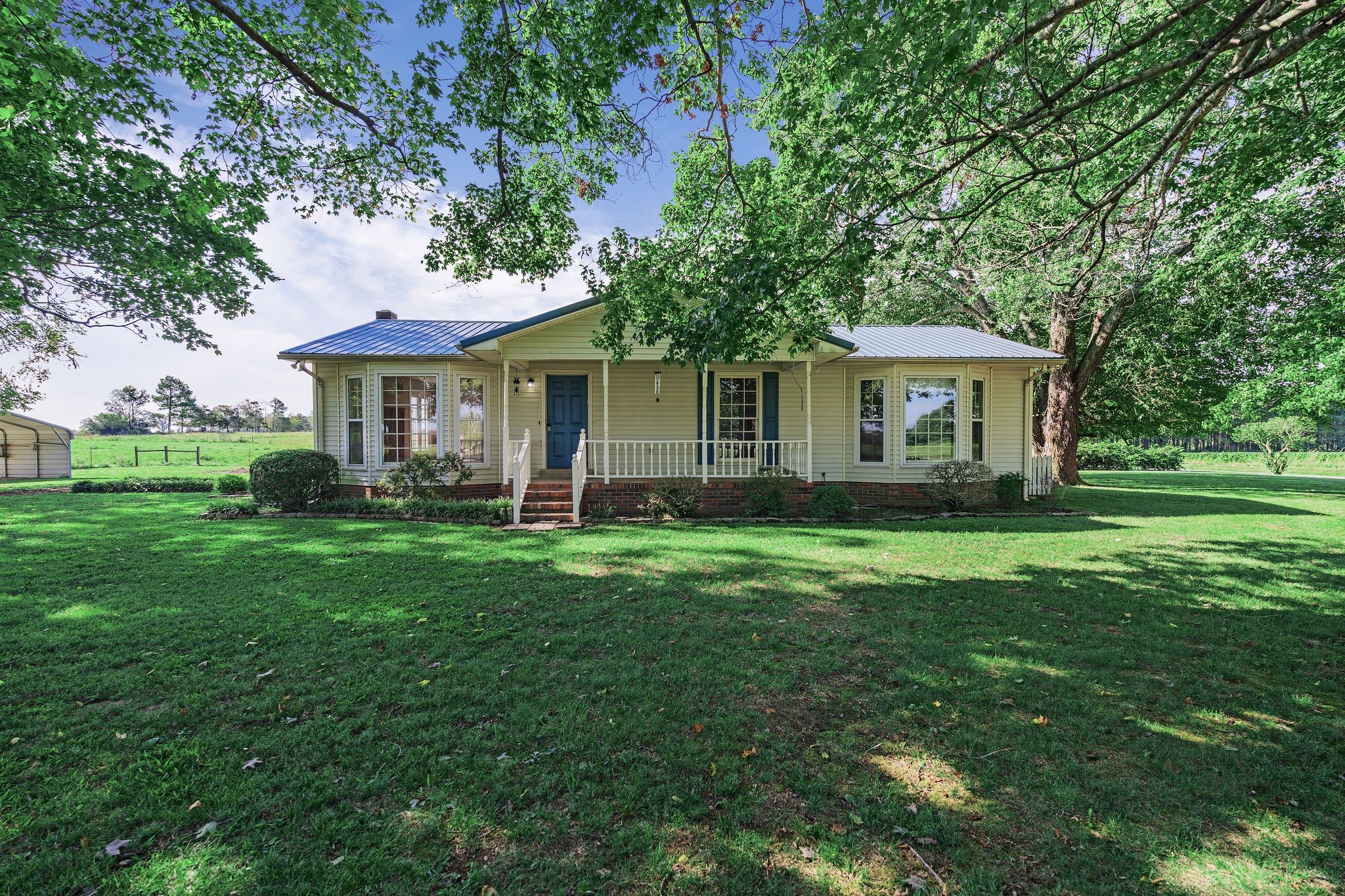 155 Marcella Falls Road Ethridge, TN 38456 - Photo 3 of 33 a view of a house with a backyard