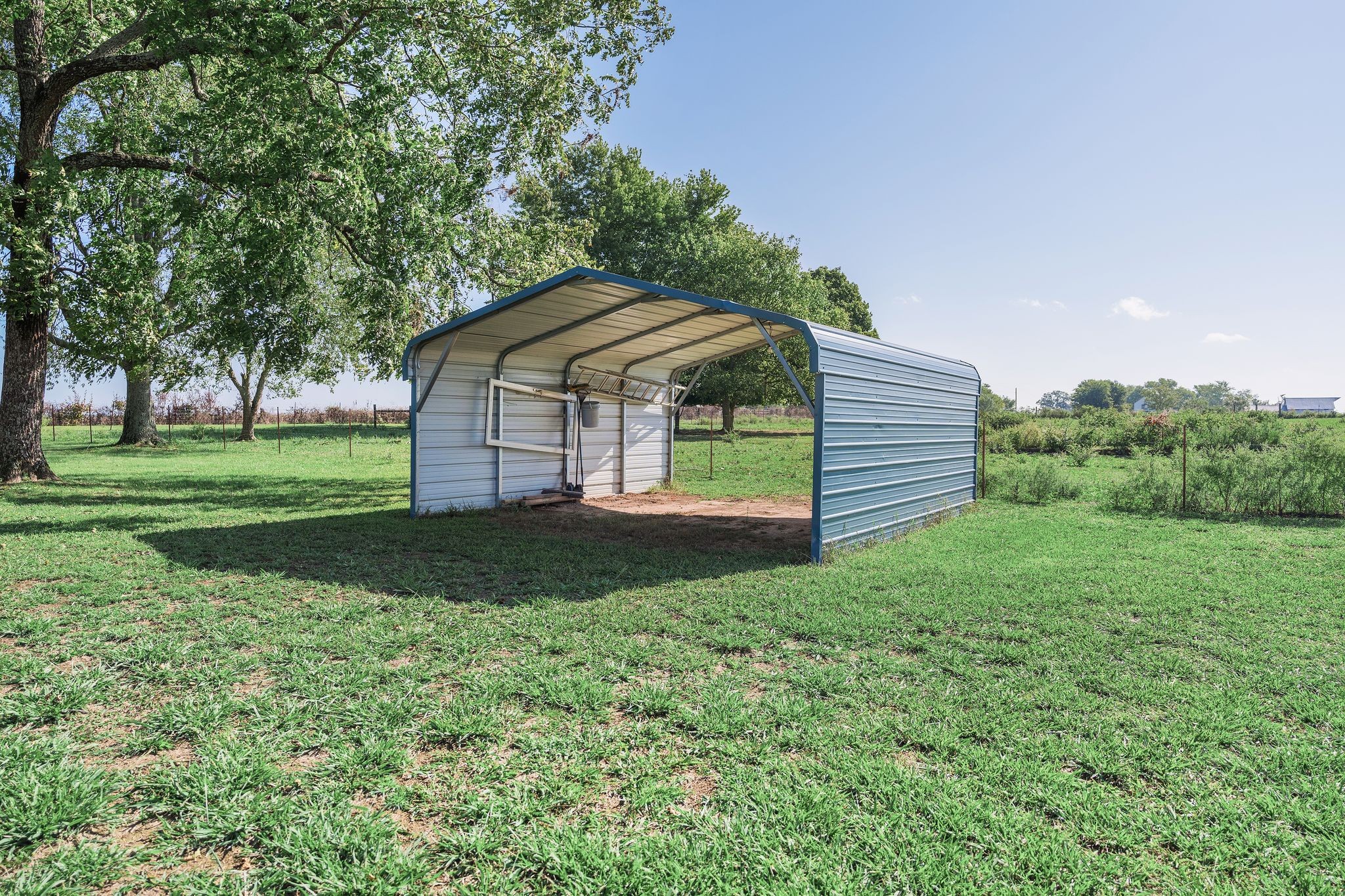155 Marcella Falls Road Ethridge, TN 38456 - Photo 32 of 33 a front view of a house with a yard