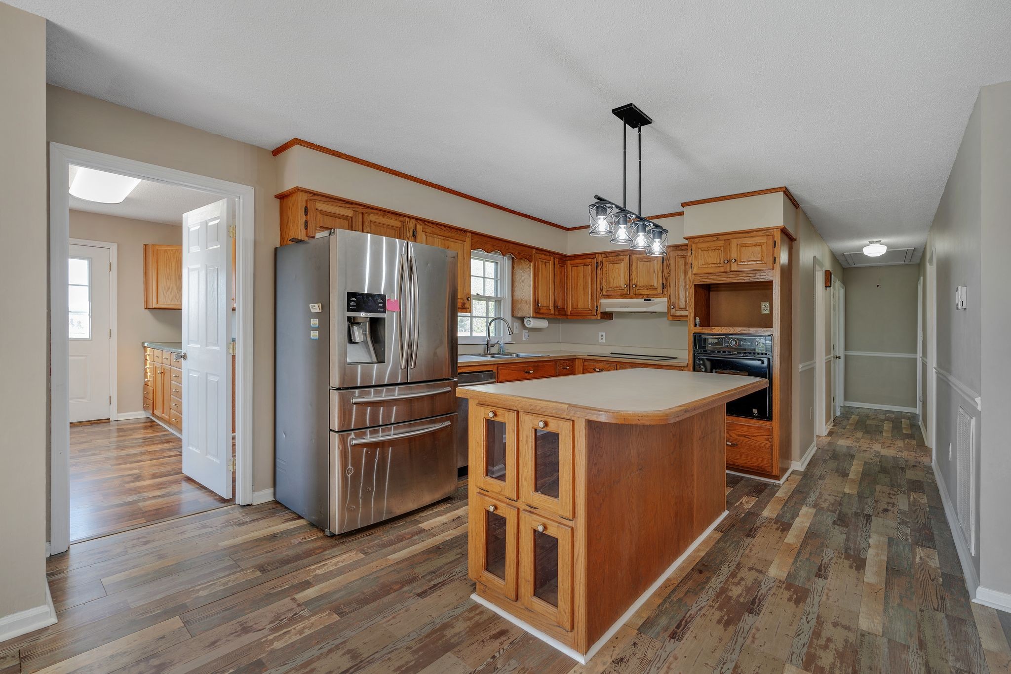 155 Marcella Falls Road Ethridge, TN 38456 - Photo 9 of 33 a kitchen that has a lot of counter space and stainless steel appliances