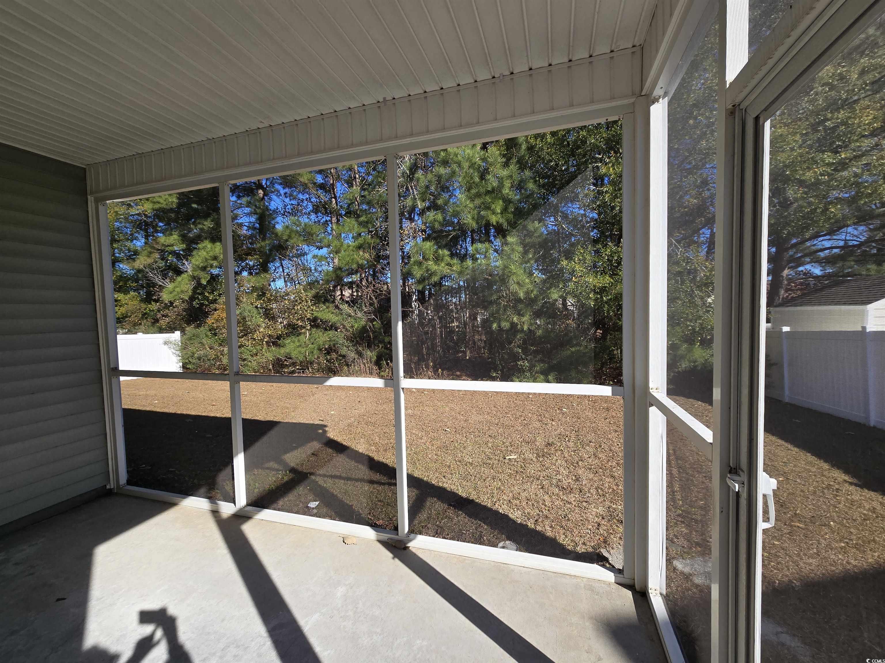 129 Powder Springs Loop Myrtle Beach, SC 29588 - Photo 20 of 23 View of unfurnished sunroom