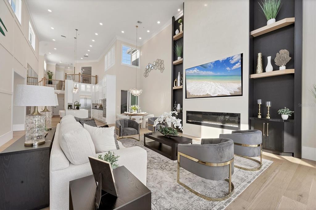 3540 Mistletoe Lane Longboat Key, FL 34228 - Photo 13 of 80 a living room with furniture and kitchen view