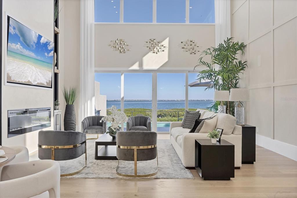 3540 Mistletoe Lane Longboat Key, FL 34228 - Photo 14 of 80 a living room with furniture and a potted plant