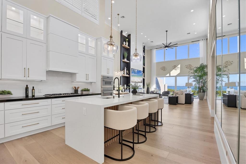 3540 Mistletoe Lane Longboat Key, FL 34228 - Photo 22 of 80 a large kitchen with lots of counter space and appliances