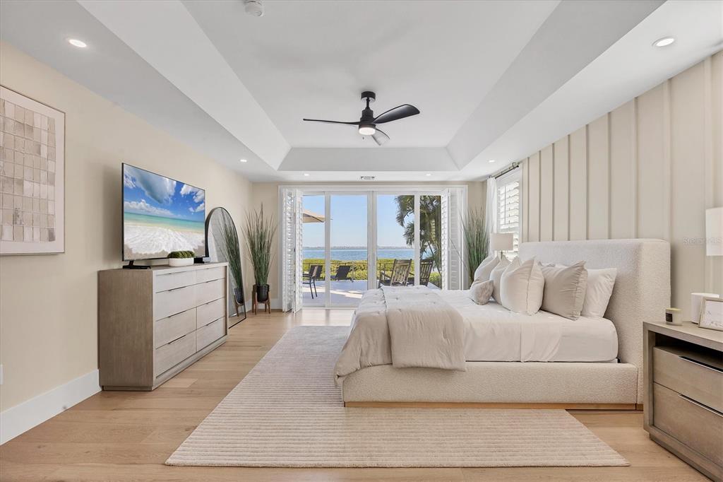 3540 Mistletoe Lane Longboat Key, FL 34228 - Photo 25 of 80 a living room with furniture and a flat screen tv