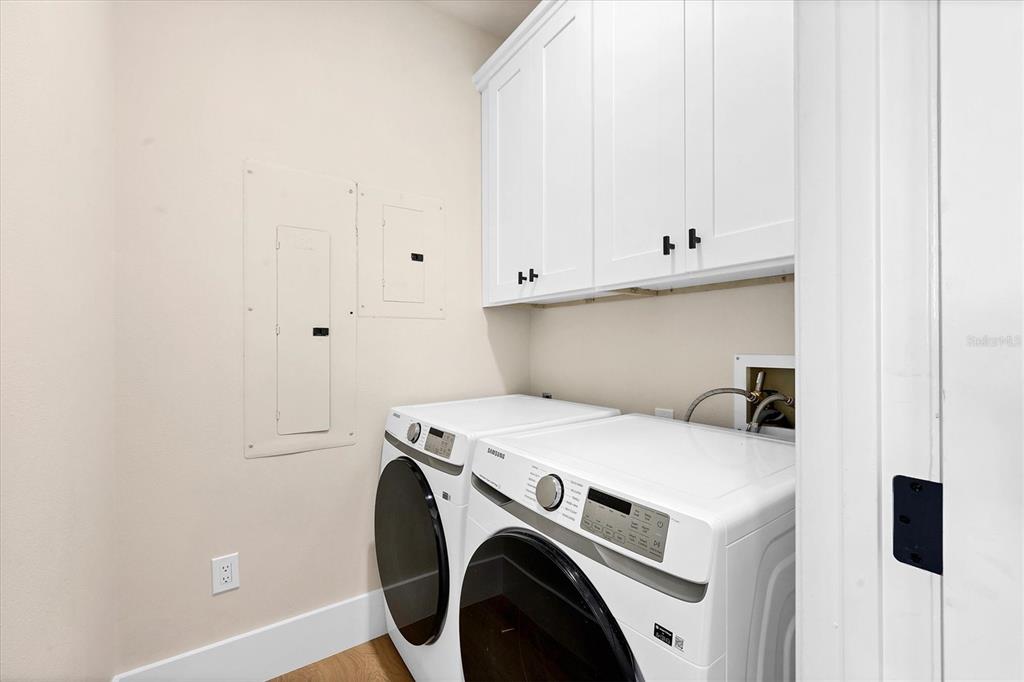 3540 Mistletoe Lane Longboat Key, FL 34228 - Photo 42 of 80 a utility room with dryer and washer