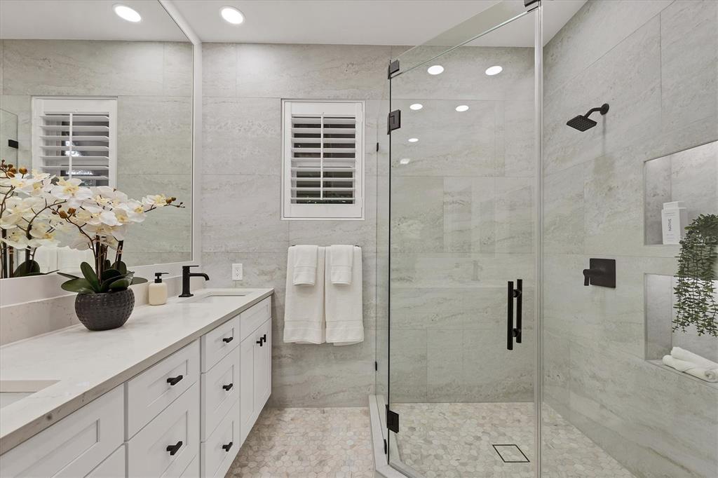 3540 Mistletoe Lane Longboat Key, FL 34228 - Photo 44 of 80 a bathroom with double vanity and a shower