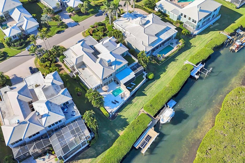 3540 Mistletoe Lane Longboat Key, FL 34228 - Photo 58 of 80 an aerial view of a house with a swimming pool