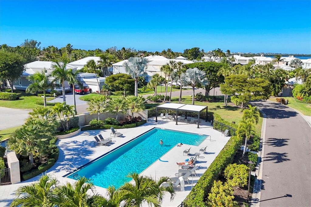 3540 Mistletoe Lane Longboat Key, FL 34228 - Photo 64 of 80 an aerial view of a house with swimming pool garden and lake view