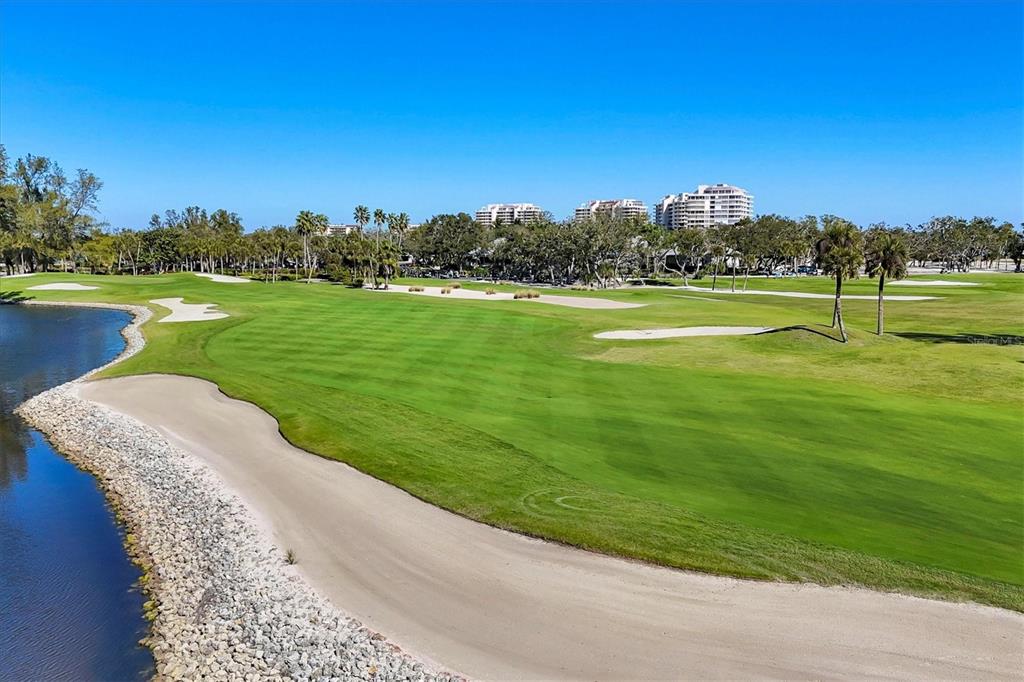 3540 Mistletoe Lane Longboat Key, FL 34228 - Photo 67 of 80 a view of a lake and a yard