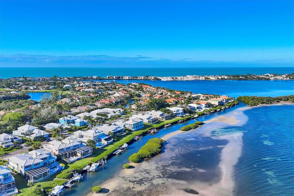 3540 Mistletoe Lane Longboat Key, FL 34228 - Photo 72 of 80 an aerial view of a city with lots of residential buildings