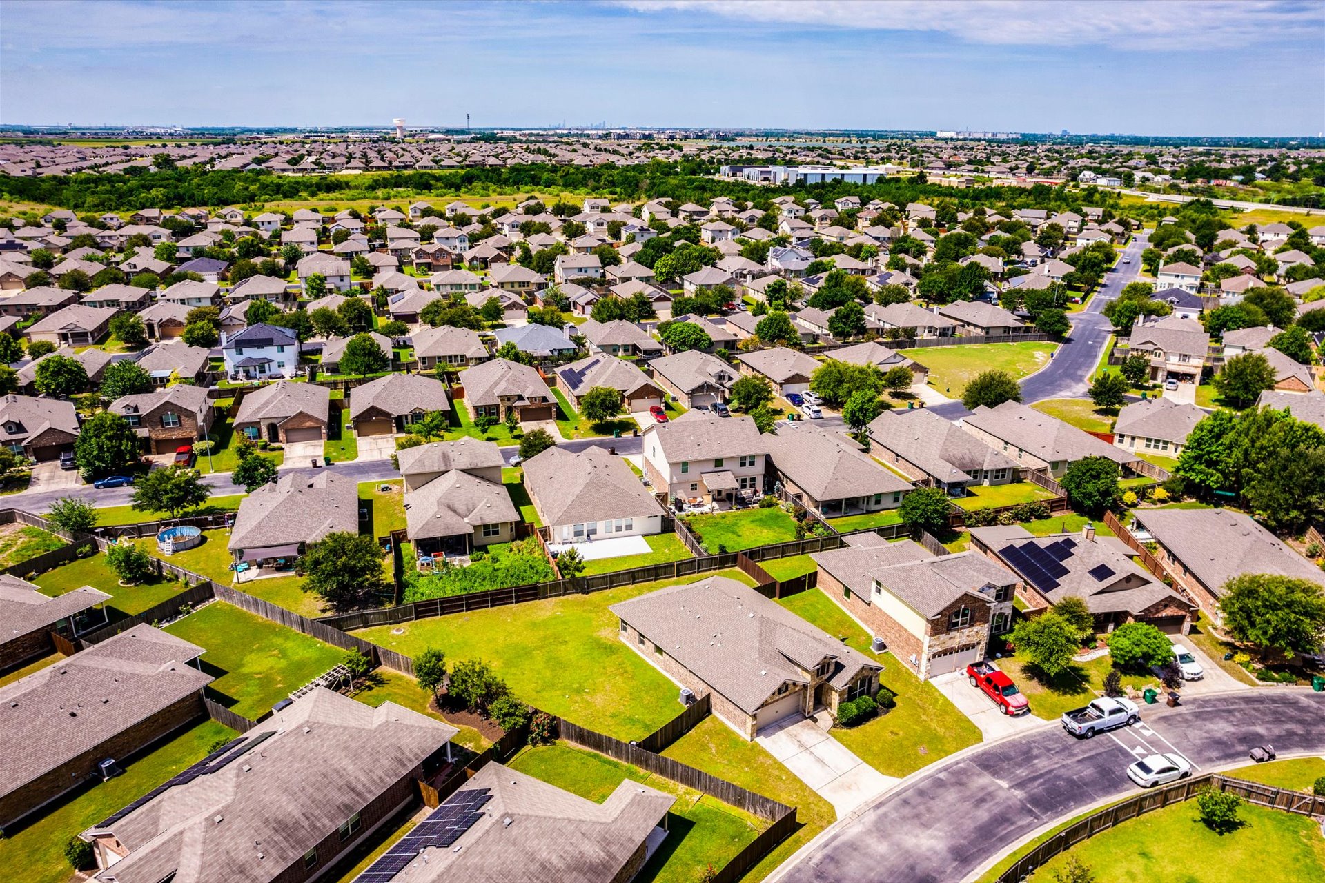 16829 Ruggio Road Pflugerville, TX 78660 - Photo 34 of 40 an aerial view of residential houses with outdoor space and swimming pool