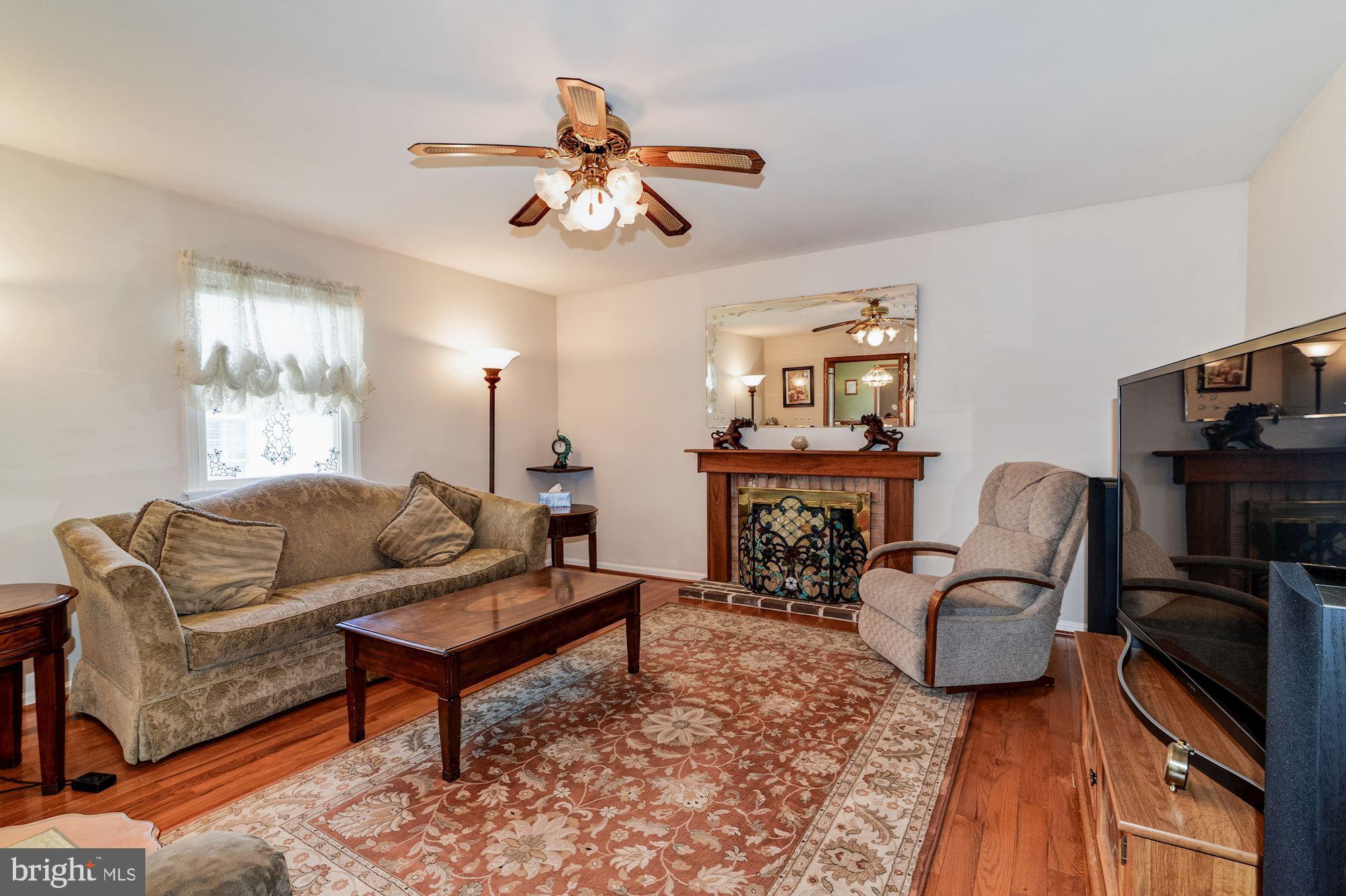3 West Belair Road Ridley Park, PA 19078 - Photo 10 of 25 Great Room w/ wood burning fireplace