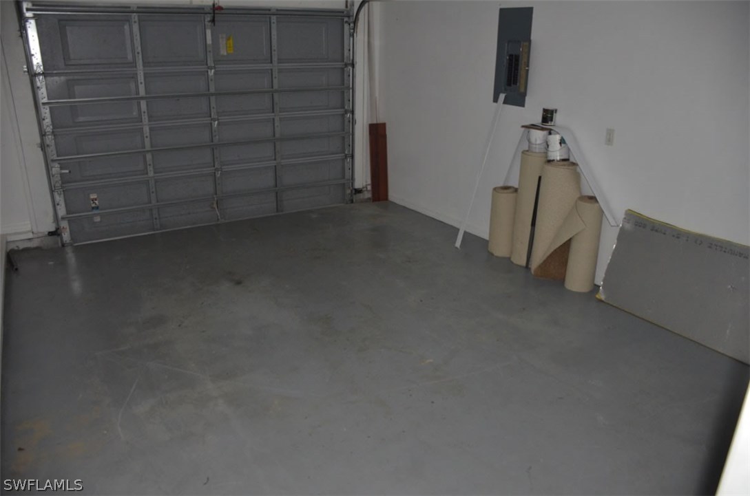3821 Sunset Road Lehigh Acres, FL 33971 - Photo 11 of 20 a view of an empty room and staircase