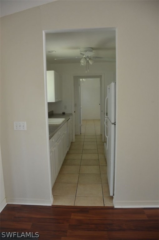 3821 Sunset Road Lehigh Acres, FL 33971 - Photo 6 of 20 a bathroom with a sink and a mirror