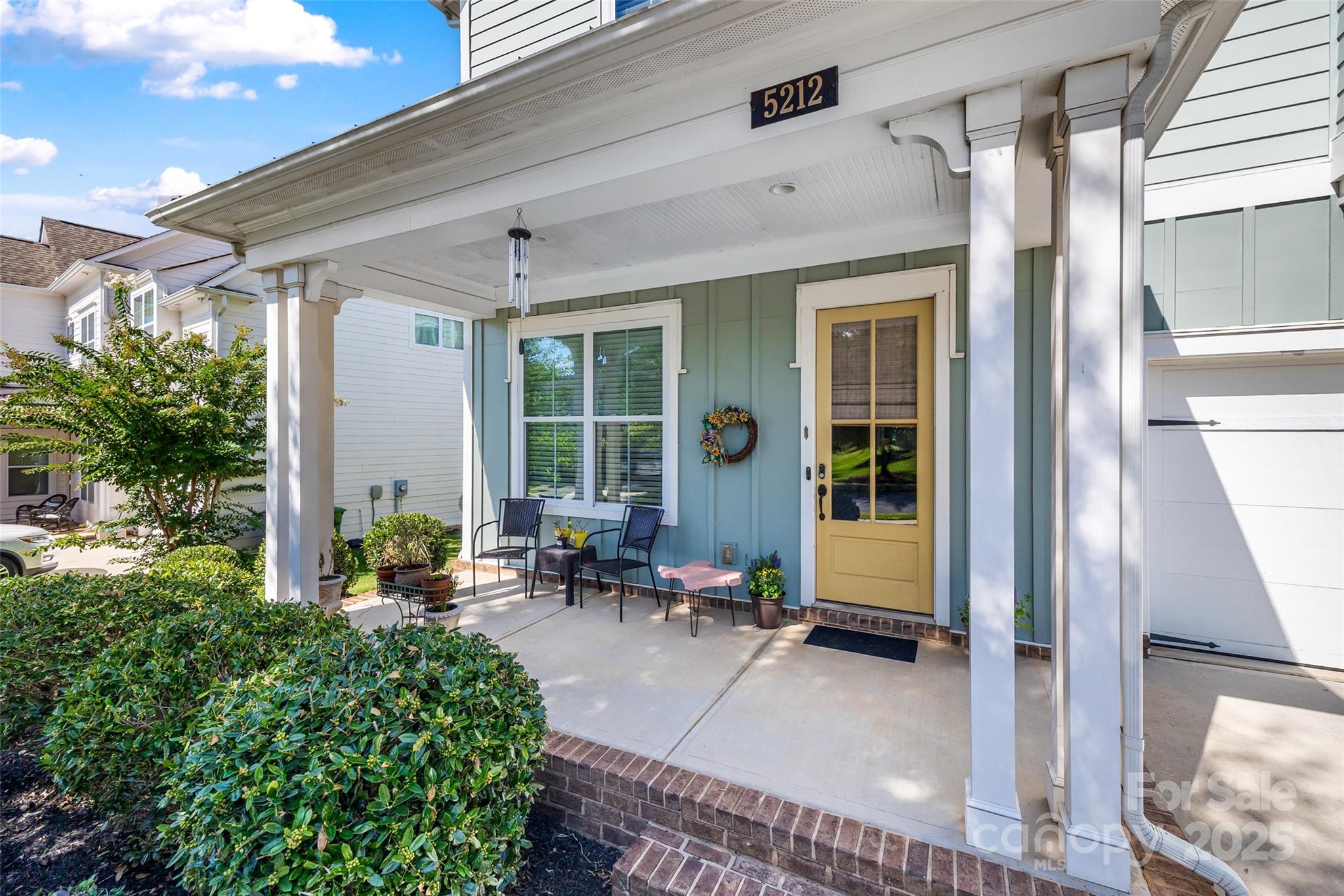 5212 Meadowcroft Way Fort Mill, SC 29708 - Photo 2 of 43 a building outdoor space with patio furniture and potted plants